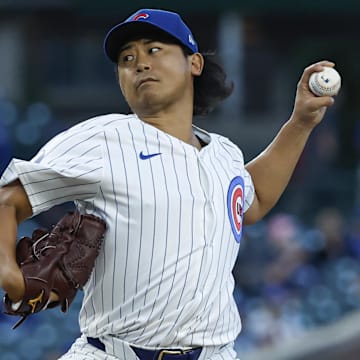 Sep 4, 2024; Chicago, Illinois, USA; Chicago Cubs starting pitcher Shota Imanaga (18) delivers a pitch against the Pittsburgh Pirates during the first inning at Wrigley Field.