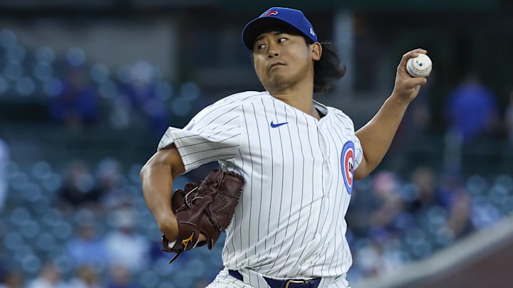 Sep 4, 2024; Chicago, Illinois, USA; Chicago Cubs starting pitcher Shota Imanaga (18) delivers a pitch against the Pittsburgh Pirates during the first inning at Wrigley Field.