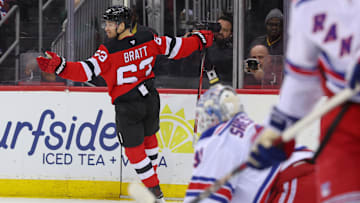 Apr 5, 2025; Newark, New Jersey, USA; New Jersey Devils left wing Jesper Bratt (63) celebrates his goal against the New York Rangers during the second period at Prudential Center. Mandatory Credit: Ed Mulholland-Imagn Images