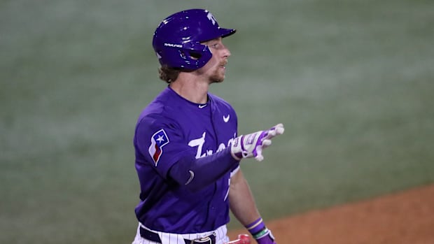 TCU infielder Cole Cramer flips his bat after this walk-off base hit that drove in the winning run in Friday's game against B