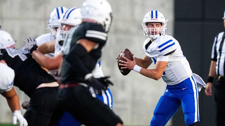 Waukee Northwest's Mack Heitland (14) looks to his receivers during a game against Des Moines Roosevelt on Thursday, Sept. 12, 2024, at Mediacom Stadium in Des Moines.