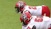 Oct 10, 2020; Charlottesville, Virginia, USA; The Virginia Cavaliers offense lines up against the North Carolina State Wolfpack defense in the fourth quarter at Scott Stadium. Mandatory Credit: Geoff Burke-Imagn Images
