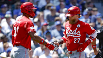 Cincinnati Reds outfielder Jake Fraley (27) is congratulated by outfielder Will Benson
