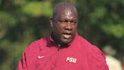 Florida State Seminoles running backs coach David Johnson shouts instructions during practice.