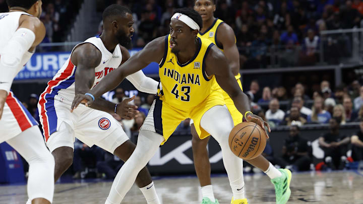 Oct 23, 2024; Detroit, Michigan, USA;  Indiana Pacers forward Pascal Siakam (43) is defended by Detroit Pistons forward Tim Hardaway Jr. (8) in the second half at Little Caesars Arena. Mandatory Credit: Rick Osentoski-Imagn Images