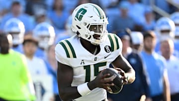 Sep 7, 2024; Chapel Hill, North Carolina, USA; Charlotte 49ers quarterback Deshawn Purdie (15) looks to pass in the third quarter at Kenan Memorial Stadium. Mandatory Credit: Bob Donnan-Imagn Images
