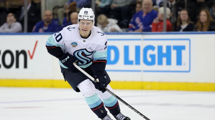 Jan 16, 2024; New York, New York, USA; Seattle Kraken right wing Eeli Tolvanen (20) brings the puck up ice against the New York Rangers during the second period at Madison Square Garden. Mandatory Credit: Brad Penner-USA TODAY Sports