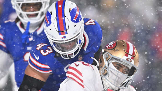 San Francisco 49ers wide receiver Jauan Jennings (15) is tackled by Buffalo Bills linebacker Terrel Bernard (43) 