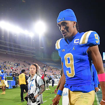 Aug 30, 2025; Pasadena, California, USA; UCLA Bruins quarterback Nico Iamaleava (9) following the loss against the Utah Utes during the second half at Rose Bowl. Mandatory Credit: Gary A. Vasquez-Imagn Images