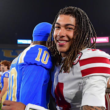  TJ Lateef meets with UCLA Bruins quarterback Madden Iamaleava following the game at the Rose Bowl.