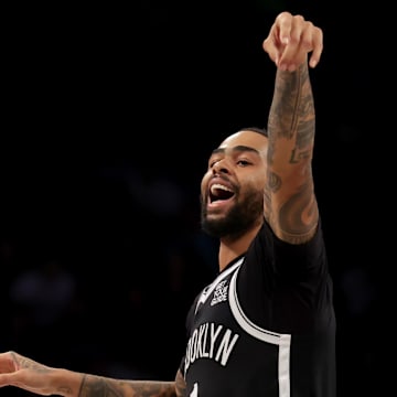 Mar 28, 2025; Brooklyn, New York, USA; Brooklyn Nets guard D'Angelo Russell (1) reacts after missing a three point shot against the Los Angeles Clippers during the third quarter at Barclays Center. Mandatory Credit: Brad Penner-Imagn Images
