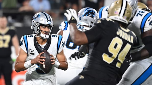 Carolina Panthers quarterback Bryce Young (9) is pressured by New Orleans Saints defensive end Cameron Jordan (94) 