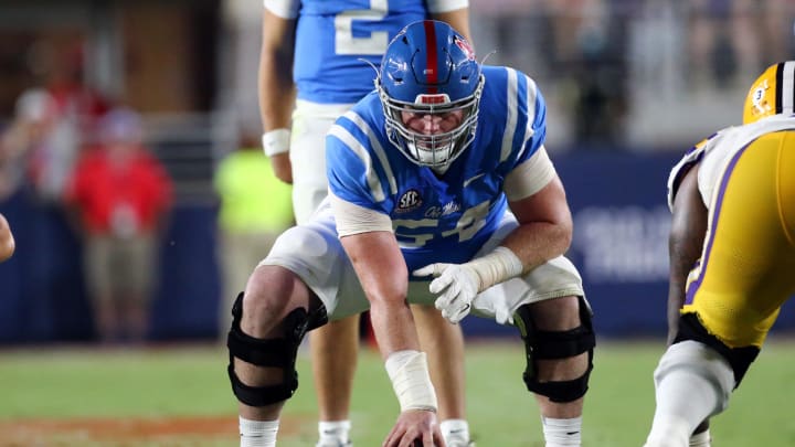 Sep 30, 2023; Oxford, Mississippi, USA; Mississippi Rebels offensive linemen Caleb Warren (54) waits to snap the ball during the second half against the LSU Tigers at Vaught-Hemingway Stadium. Mandatory Credit: Petre Thomas-USA TODAY Sports