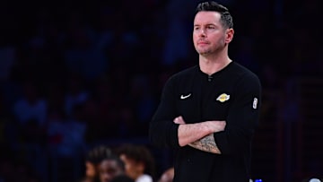  Los Angeles Lakers head coach JJ Redick watches game action against the Golden State Warriors during the second half at Crypto.com Arena.