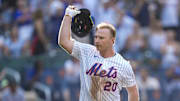 Sep 14, 2025; New York City, New York, USA; New York Mets first baseman Pete Alonso (20) throws his helmet after hitting a walk off three run home run against the Texas Rangers during the tenth inning at Citi Field. Mandatory Credit: Gregory Fisher-Imagn Images