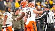 Cincinnati Bengals wide receiver Ja'Marr Chase (1) is pushed out of a skirmish at midfield in the fourth quarter of the NFL Week 11 game between the Pittsburgh Steelers and the Cincinnati Bengals at Acrisure Stadium in Pittsburgh on Sunday, Nov. 16, 2025. The Bengals lost 34-12.