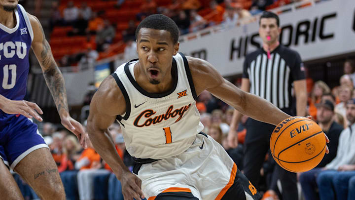 Jan 23, 2024; Stillwater, Oklahoma, USA; Oklahoma State Cowboys guard Bryce Thompson (1) drives to the basket during the first half against the TCU Horned Frogs at Gallagher-Iba Arena. Mandatory Credit: William Purnell-Imagn Images