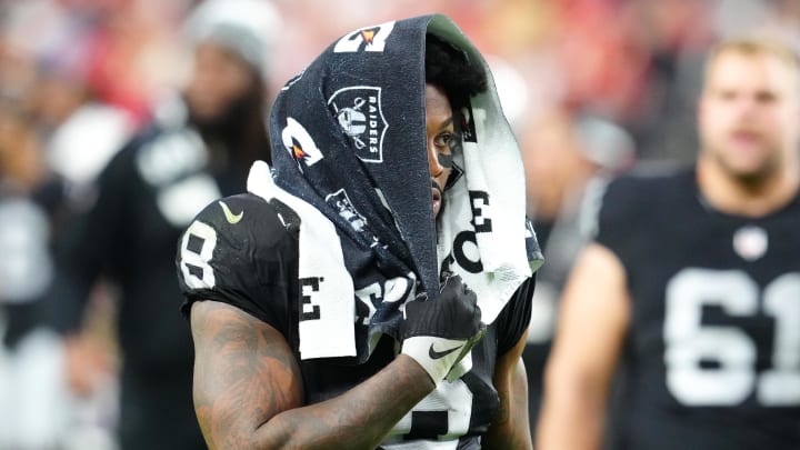 Nov 26, 2023; Paradise, Nevada, USA; Las Vegas Raiders running back Josh Jacobs (8) walks off the field after the Chiefs defeated the Raiders 31-17 at Allegiant Stadium. Mandatory Credit: Stephen R. Sylvanie-USA TODAY Sports