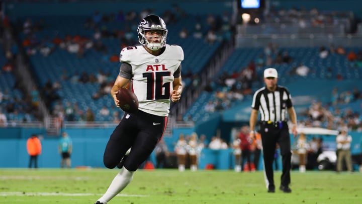 Aug 9, 2024; Miami Gardens, Florida, USA; Atlanta Falcons quarterback Nathan Rourke (16) runs with the football against the Miami Dolphins during the fourth quarter at Hard Rock Stadium. Mandatory Credit: Sam Navarro-USA TODAY Sports