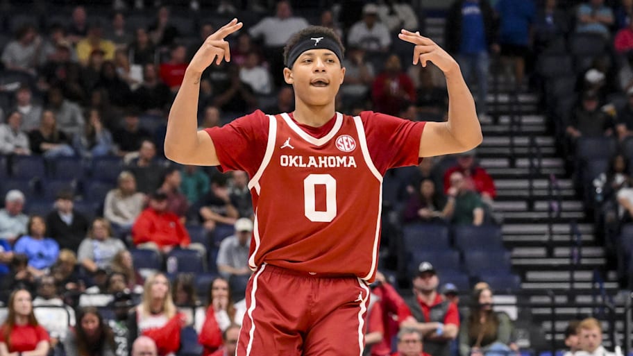 Oklahoma Sooners guard Jeremiah Fears (0) reacts after a three point basket against the Georgia Bulldogs.