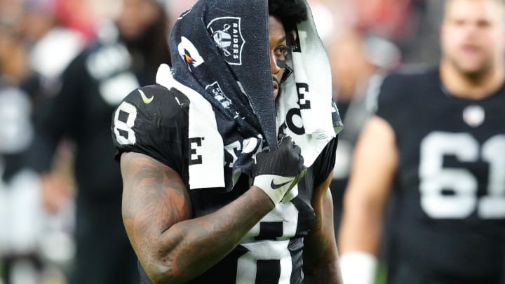 Nov 26, 2023; Paradise, Nevada, USA; Las Vegas Raiders running back Josh Jacobs (8) walks off the field after the Chiefs defeated the Raiders 31-17 at Allegiant Stadium. Mandatory Credit: Stephen R. Sylvanie-USA TODAY Sports