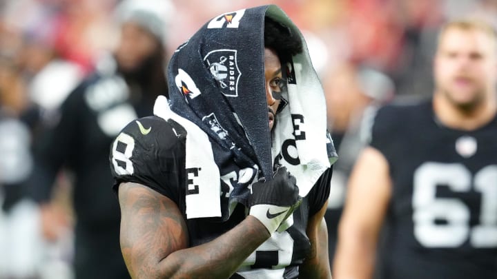 Nov 26, 2023; Paradise, Nevada, USA; Las Vegas Raiders running back Josh Jacobs (8) walks off the field after the Chiefs defeated the Raiders 31-17 at Allegiant Stadium. Mandatory Credit: Stephen R. Sylvanie-USA TODAY Sports