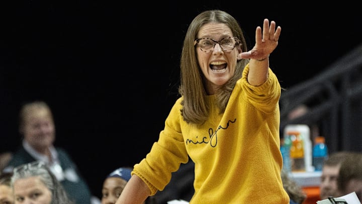 Michigan women’s coach Kim Barnes Arico calls to her team during the first half against Oregon at Matthew Knight Arena Dec. 29, 2025.