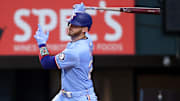 Texas Rangers catcher Jonah Heim (28) singles in a run during the third inning against the Atlanta Braves at Globe Life Field. 