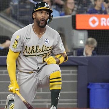Jun 1, 2025; Toronto, Ontario, CAN; Oakland Athletics third baseman Miguel Andujar (22) reacts after a strike from the Toronto Blue Jays during the first inning at Rogers Centre. Mandatory Credit: John E. Sokolowski-Imagn Images