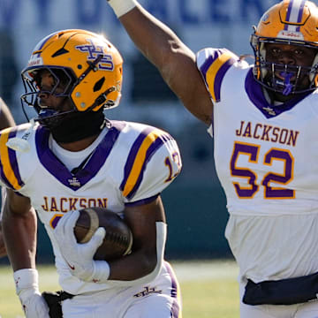 Jackson's Ezavier Crowell (13) breaks a long touchdown run against Cherokee County in the 2024 AHSAA 4A State Championship game.