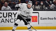 Feb 24, 2024; Los Angeles, California, USA; Los Angeles Kings right wing Arthur Kaliyev (34) shoots on goal against the Anaheim Ducks during the second period at Crypto.com Arena. Mandatory Credit: Gary A. Vasquez-Imagn Images