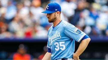 Apr 27, 2025; Kansas City, Missouri, USA; Kansas City Royals pitcher Chris Stratton (35) between innings against the Houston Astros at Kauffman Stadium. Mandatory Credit: William Purnell-Imagn Images