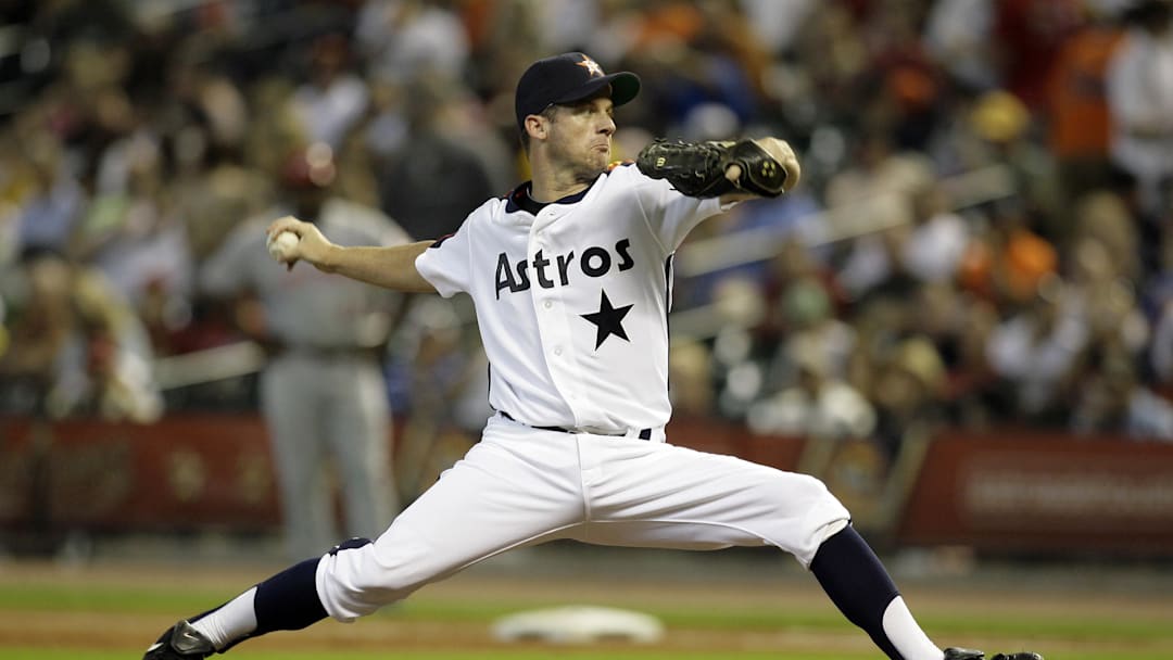 July 24, 2010; Houston, TX, USA; Houston Astros starting pitcher Roy Oswalt (44) throws a pitch against the Cincinnati Reds in the first inning at Minute Maid Park. The Reds defeated the Astros 7-0. July 24, 2010; Houston, TX, USA; Houston Astros starting pitcher Roy Oswalt (44) throws a pitch against the Cincinnati Reds in the first inning at Minute Maid Park. The Reds defeated the Astros 7-0.