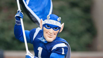 Sep 29, 2012; Winston Salem, NC, USA; The Duke Blue Devils mascot runs the flag across the field after a score during the first quarter against the Wake Forest Demon Deacons at BB&T field. Mandatory Credit: Jeremy Brevard-USA TODAY Sports