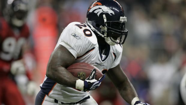 Denver Broncos running back Travis Henry (20) runs the ball against the Houston Texans in the fourth quarter at Reliant Stadi