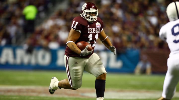 Dec 29 2007; San Antonio, TX, USA; Texas A&M Aggies running back Jorvorskie Lane (11) runs the ball in the first quarter against the Penn State Nittany Lions in the Valero Alamo Bowl at the Alamodome. Mandatory Credit: Brendan Maloney-USA TODAY Sports