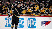 Jan 7, 2025; Pittsburgh, Pennsylvania, USA; Pittsburgh Penguins left wing Michael Bunting (8) celebrates his goal against the Columbus Blue Jackets during the second period at PPG Paints Arena. Mandatory Credit: Charles LeClaire-Imagn Images