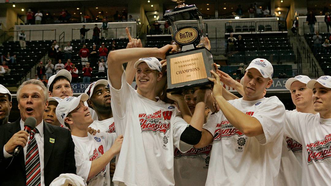 The Wisconsin Badgers Mens Basketball team celebrates the Big Title during a trophy presentation following their 61-48 win over Illinois, Sunday, March 16, 200 at the Conceco Fieldhouse in Indianapolis. Coach Bo Ryan is on far left and players holding trophy are as follow, left , Brian Butch and right, Greg Stiemsma. Journal Sentinel Photo by RICK WOOD/ RWOOD@JOURNALSENTINEL.COM