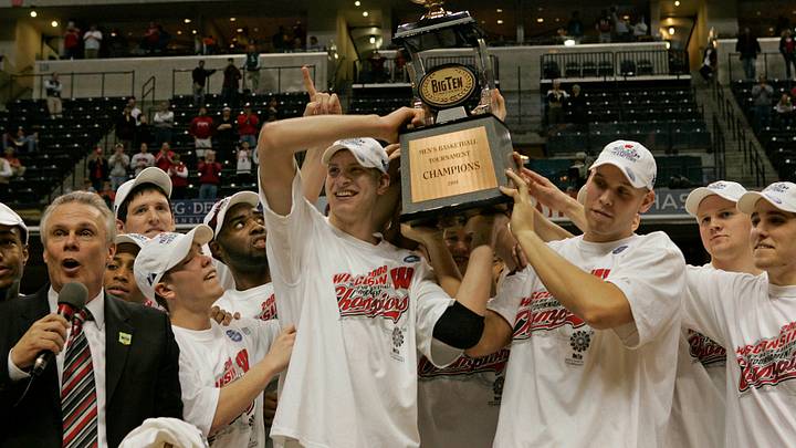 The Wisconsin Badgers Mens Basketball team celebrates the Big Title during a trophy presentation following their 61-48 win over Illinois, Sunday, March 16, 200 at the Conceco Fieldhouse in Indianapolis. Coach Bo Ryan is on far left and players holding trophy are as follow, left , Brian Butch and right, Greg Stiemsma. Journal Sentinel Photo by RICK WOOD/ RWOOD@JOURNALSENTINEL.COM