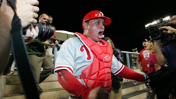 October 15, 2008; Los Angeles, CA, USA; Philadelphia Phillies catcher Carlos Ruiz (51) celebrates the Phillies 5-1 victory against the Los Angeles Dodgers during game five of the NLCS at Dodger Stadium. The Philies win the series 4 games to 1 and advance to the World Series. Mandatory Credit: Gary A. Vasquez-USA TODAY Sports