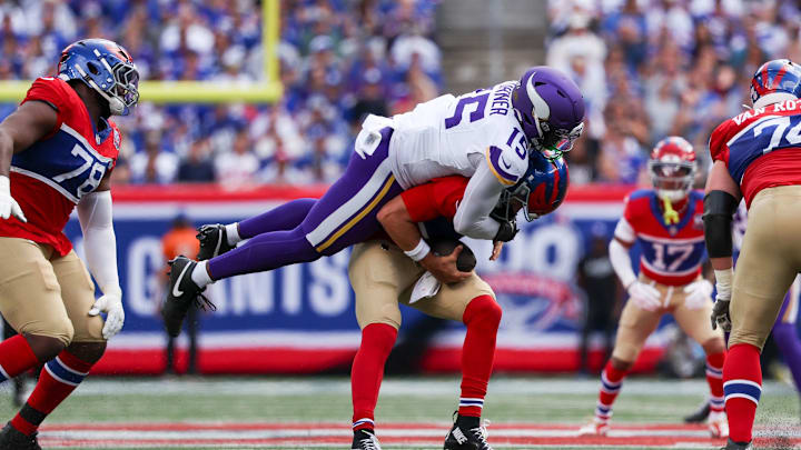 Dallas Turner sacks Daniel Jones.