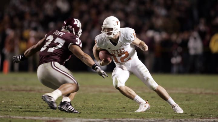 Nov 23, 2007; College Station, TX; Texas Longhorns quarterback Colt McCoy (12) runs the ball against the Texas A&M Aggies.