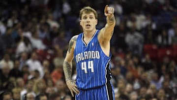 Orlando Magic guard Jason Williams instructs a teammate to box out against the Sacramento Kings.