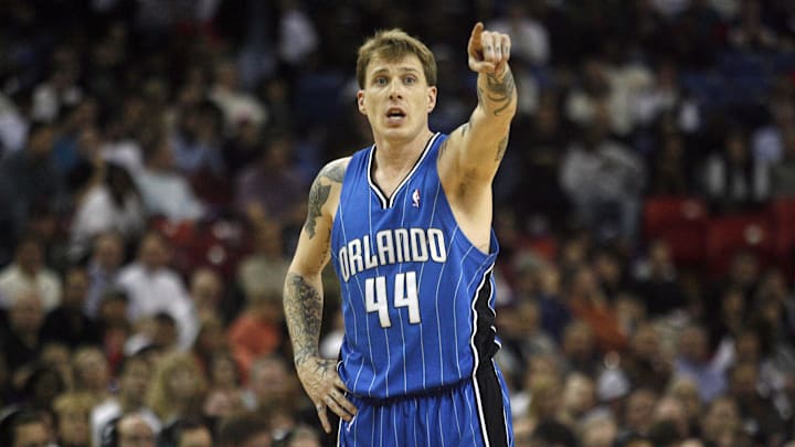 Orlando Magic guard Jason Williams instructs a teammate to box out against the Sacramento Kings.