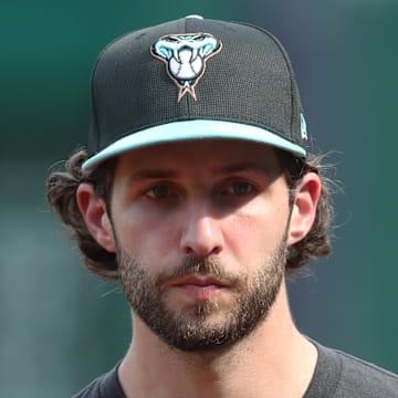 Jul 25, 2025; Pittsburgh, Pennsylvania, USA; Arizona Diamondbacks pitcher Zac Gallen (23) looks on before the game against the Pittsburgh Pirates at PNC Park. Mandatory Credit: Charles LeClaire-Imagn Images