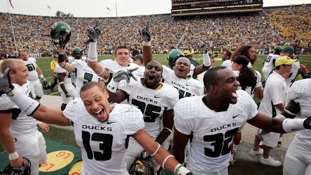 Oregon football players celebrate with seconds to go as the win Michigan at the Big House becomes certain in 2007.