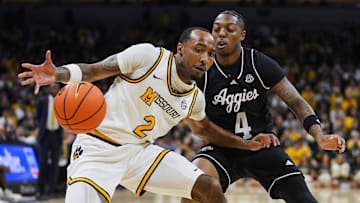 Missouri Tigers guard Tamar Bates (2) loses control of the ball in a game versus the Texas A&M Aggies this season.