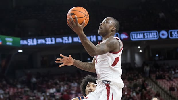 Arkansas guard Johnell Davis goes up for a lay-up past Texas-San Antonio.