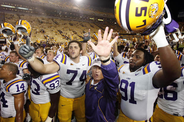 LSU Tigers Head Coach Les Miles waves to the crowd.
