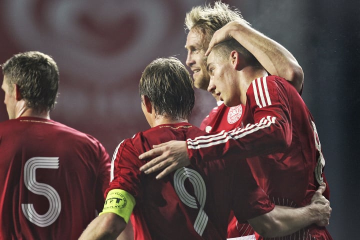 Denmark's Nicklas Bendtner (R) celebrate